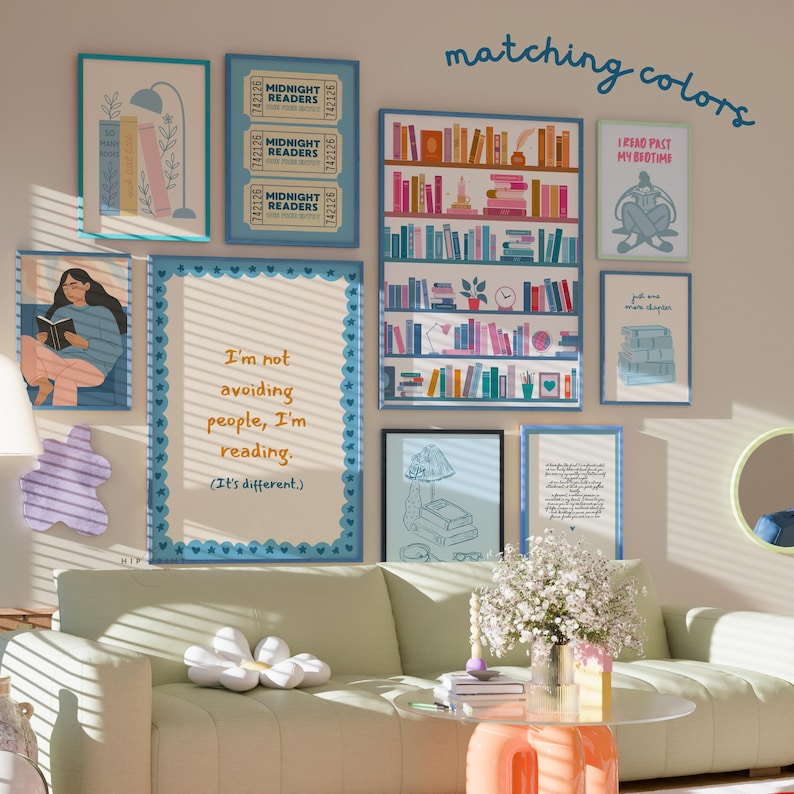 May include: A collection of framed art prints with a reading theme, including illustrations of bookshelves, quotes, and a person reading. The color palette features blues, pinks, and neutral tones, creating a cozy and inviting atmosphere. The text "matching colors" is visible.