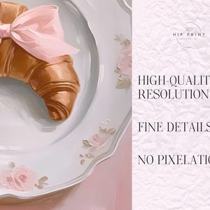 May include: A croissant tied with a pink ribbon on a white plate with a floral design.