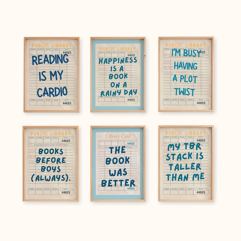 May include: Six framed prints with library-themed quotes. The quotes are written in blue ink on a vintage library card design. The quotes include "Reading is my cardio," "Happiness is a book on a rainy day," and "My TBR stack is taller than me."