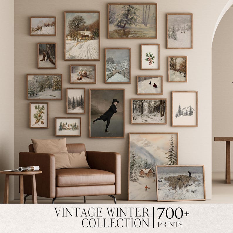 May include: A living room interior with a brown leather armchair and a wall gallery of framed winter-themed prints. The prints feature snowy landscapes, forest scenes, and a figure ice skating. The text "Vintage Winter Collection | 700+ Prints" is displayed at the bottom of the image.