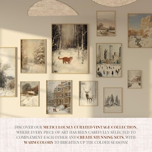 May include: A collection of vintage winter-themed art prints in various styles, including a snowy forest scene with a cat, a cityscape with ice skaters, and a deer in a winter forest. The prints are framed in simple, wooden frames and are arranged on a white wall.