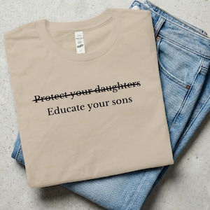 Bescherm je dochters, onderwijs je zonen T-shirt | Biologisch katoen | Feministisch statement T-shirt | T-shirt voor gelijkheid | Protestshirt | Vrouwenrechten