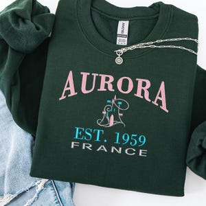 Embroidered Disney princess aurora sweatshirt, aurora shirt, cute aurora varsity sweatshirt, princess aurora disney, sleeping beauty shirt