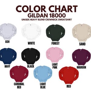 May include: Color chart of Gildan 18000 unisex heavy blend crewneck sweatshirts in various colors, including ash, white, forest, sand, navy, black, light pink, maroon, cardinal red, light blue, and red.