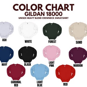 May include: A colour chart of Gildan 18000 unisex heavy blend crewneck sweatshirts. Colours include ash, white, forest green, sand, navy, black, light pink, maroon, cardinal red, light blue, and red.
