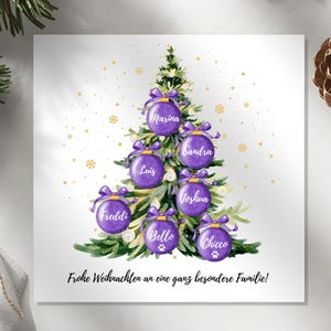 May include: A Christmas card featuring a watercolor Christmas tree decorated with purple ornaments, each bearing a name. The card includes the text "Frohe Weihnachten an eine ganz besondere Familie!" in a script font, with gold star accents.