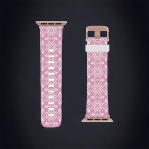 May include: A pink and white patterned Apple Watch band with a rose gold buckle.