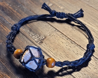 Adjustable hand-woven hemp bracelet with shells from West of Lake George in Colorado