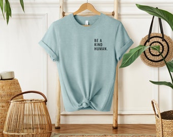 Unisex t-shirt with "Be a Kind Human" bold text, simple design graphic tee, uplifting message