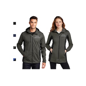 May include: Two charcoal gray hooded jackets with black accents and the text "Custom Embroidery". The jackets have a full-zip front, pockets, and are made of a soft, flexible material. One jacket is worn by a man, the other by a woman.