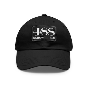 May include: Black baseball cap with a curved brim. A white rectangular patch on the front displays the number "488" in bold font, along with the text "D&RGW" and "K-36". The cap is made of a soft, durable fabric.