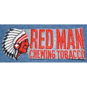 May include: Red Man Chewing Tobacco embroidered patch with a red and white Native American head wearing a feathered headdress.