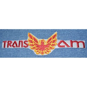 May include: Red and yellow embroidered patch with a bird design and the text "TRANS AM"