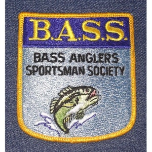 May include: A blue and yellow embroidered patch with the text "B.A.S.S. Bass Anglers Sportsman Society" and a jumping bass fish illustration.