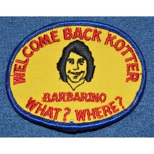 May include: A yellow and blue oval-shaped patch with red embroidered text that reads "Welcome Back Kotter" and "What? Where?" with a cartoon image of a man with black hair and a smiling face. The text " Barbarino" is embroidered in red below the image.