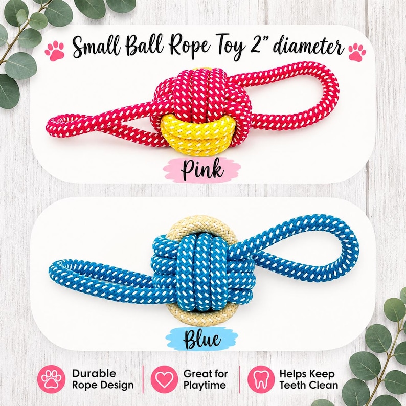May include: Two small ball rope toys with a 2-inch diameter. The top toy is pink with white flecks and a yellow center. The bottom toy is blue with white flecks and a beige center. Both feature a knotted ball design with looped ends for pulling.