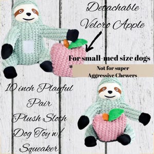 May include: A pair of plush sloth dog toys, each with a detachable pink apple. The sloths are light green with black accents and brown faces. The apples have green leaves and orange stems. The toys are 10 inches long and designed for small to medium-sized dogs.