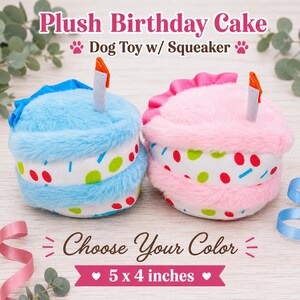 May include: Two plush birthday cake dog toys with squeakers, one blue and one pink. Each features a white middle layer with colorful polka dots and a single candle on top. The text reads Plush Birthday Cake Dog Toy w/ Squeaker, Choose Your Color, and 5 x 4 inches.