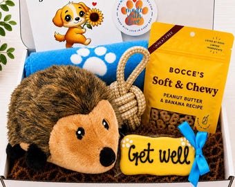 May include: A gift box containing a plush hedgehog toy, a blue blanket with white paw prints, a tan rope toy, a bag of Bocce's Soft & Chewy peanut butter and banana dog treats, a Get Well Soon card with a puppy illustration, and a Get Well bone cookie.