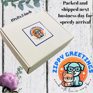 May include: A white cardboard shipping box measuring 10x8x3 inches with a square sticker featuring a blue dog and orange cat wearing glasses. The text reads Zippy Greetings, made with love in every box, and packed and shipped next business day.