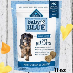 May include: A blue and white bag of Baby Blue Soft Biscuits for puppies. The bag features a puppy image and text that reads "Soft Biscuits with Chicken & Carrots." The bag contains 8 oz of treats.