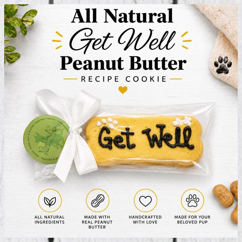 May include: A bone-shaped peanut butter cookie in a clear plastic bag with a white ribbon and a green circular tag. The cookie features black icing text that reads Get Well. The packaging includes text stating All Natural Get Well Peanut Butter.