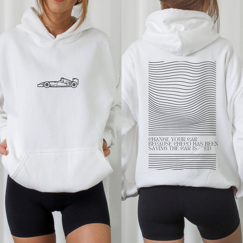 May include: White hoodie with a black outline of a racing car on the front and the text "CHANGE YOUR CAR BECAUSE CHECO HAS BEEN SAYING THE CAR IS ED" on the back.