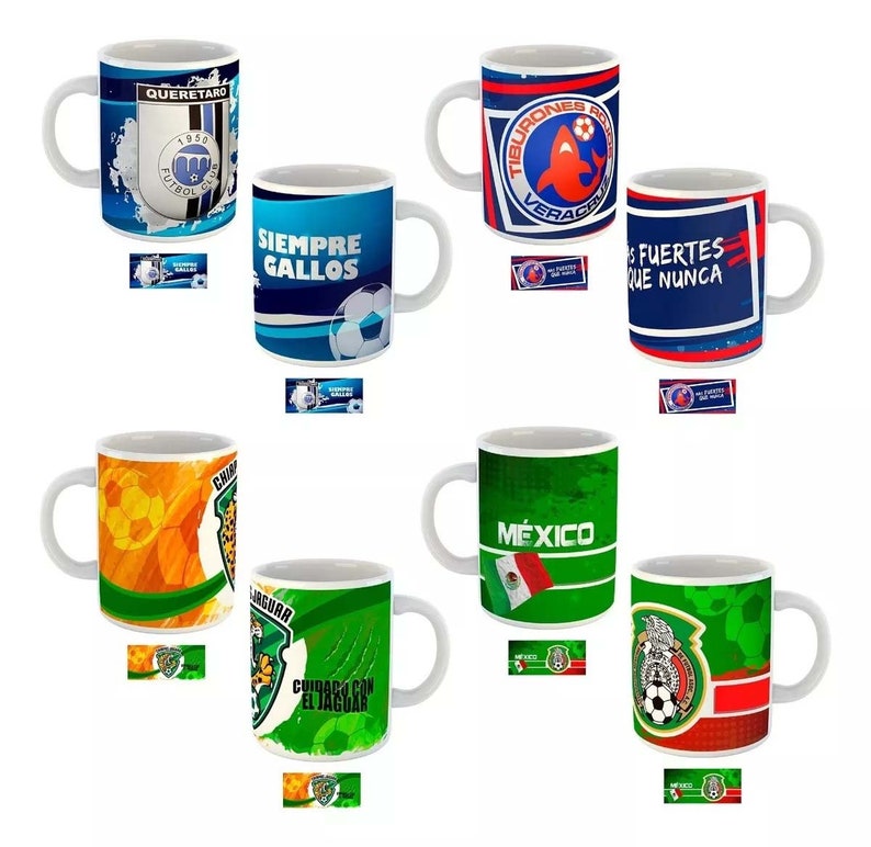 May include: A collection of white ceramic mugs featuring soccer team logos and text. Designs include team names, logos, and the Mexican flag. The mugs have various color schemes, including blue, green, and orange.