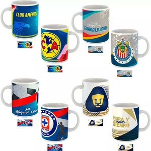 May include: Collection of white ceramic mugs featuring logos and colors of various soccer teams. Designs include team names, logos, and graphics. Each mug has a white handle and a matching team-themed design.