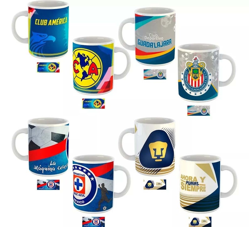 May include: Collection of white ceramic mugs featuring logos and colors of various soccer teams. Designs include team names, logos, and graphics. Each mug has a white handle and a matching team-themed design.