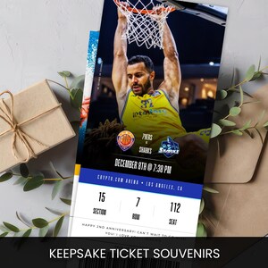 May include: A keepsake ticket souvenir featuring a basketball player dunking the ball. The ticket includes game details: 79ERS vs Sharks, December 8th at 7:30 PM, Crypto.com Arena, Los Angeles, CA. The text "KEEPSAKE TICKET SOUVENIRS" is at the bottom.