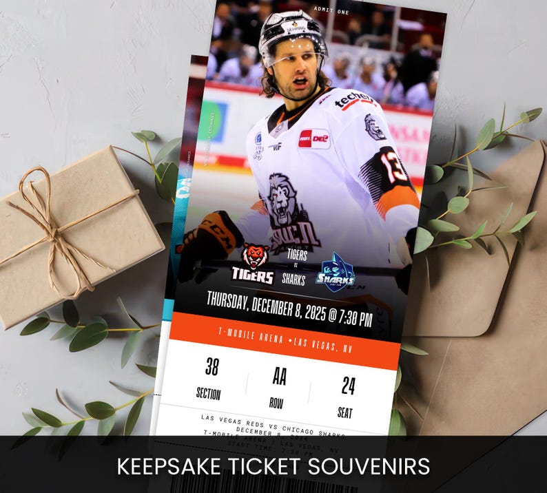 May include: A keepsake ticket souvenir featuring a hockey player in a white and orange jersey. The ticket is for a Tigers vs Sharks game at T-Mobile Arena, Las Vegas, on December 8, 2025. The text "KEEPSAKE TICKET SOUVENIRS" is at the bottom.