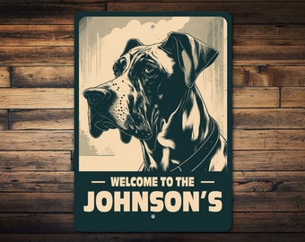 May include: A black and white illustration of a Great Dane dog's head with a collar. The dog is looking to the left. The image is on a cream background with a green border. The text "WELCOME TO THE JOHNSON'S" is on the bottom of the image.