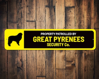 May include: Yellow and black sign with a silhouette of a Great Pyrenees dog and the text "PROPERTY PATROLLED BY GREAT PYRENEES SECURITY CO."