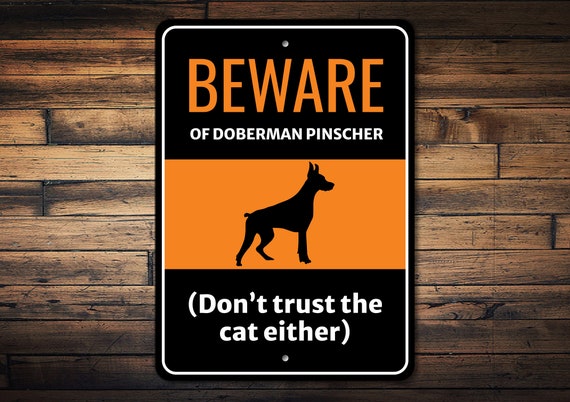 Funny Metal Tin Sign – 'Home Protected By Good Lord And Doberman Pinscher' – 8x12 Inches – Multi-Color