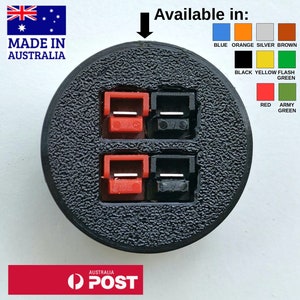 May include: A black, textured, circular product with four rectangular openings, each containing a red or black component. The text "Available in:" is above a colour chart. The Australian flag and "MADE IN AUSTRALIA" are in the upper left.