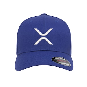 May include: A royal blue baseball cap with a white embroidered logo of a stylized 'X' on the front. The cap has a curved brim and a black adjustable strap with a white 'Flexfit' logo.