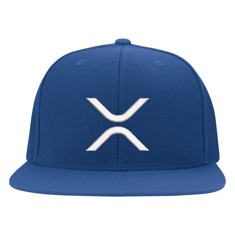 May include: A royal blue baseball cap with a white embroidered X-shaped logo.