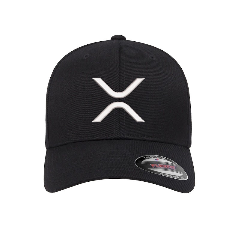 May include: Black baseball cap with a white embroidered X-shaped logo. The logo is a stylized representation of the cryptocurrency XRP.