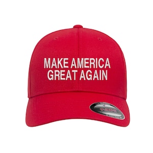 May include: Red baseball cap with white embroidered text that reads "MAKE AMERICA GREAT AGAIN".