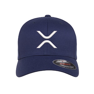 May include: A navy blue baseball cap with a white embroidered logo of a stylized letter X.