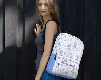 Mochila vintage azul com estampa "Door to Nature" e opção de nome personalizado.