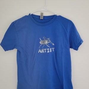 Children&#39;s size medium cotton T-shirt with &quot;ARTIST&quot; stag beetle screen print design