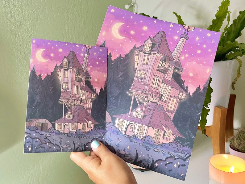May include: A whimsical illustration of a pink and purple house with a crescent moon and stars in the sky. The house has many windows and is surrounded by trees.