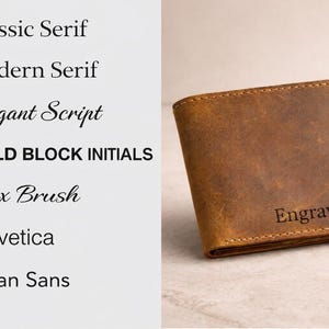 May include: A brown leather wallet with the text "Engrave Here" is displayed. The wallet is rectangular with rounded corners and a stitched border. The image also shows a list of font styles.