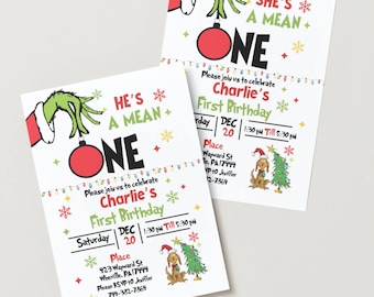 May include: Two white invitation cards with a Grinch theme. The cards read "He's a Mean One" and "She's a Mean One" with the word "ONE" in large letters. The cards are for Charlie's First Birthday, with date, time, and location details.