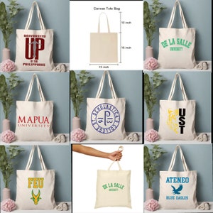 May include: Nine canvas tote bags with different university logos printed on them. The logos include University of the Philippines, Mapua University, De La Salle University, Ateneo de Manila University, FEU, and St. Scholasticas College. The bags are all beige and have black handles.