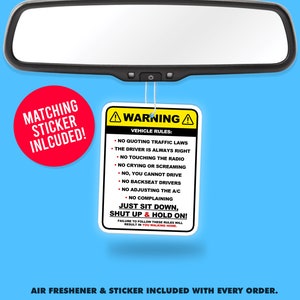 May include: A yellow and black warning sign with the text "WARNING" and "VEHICLE RULES:"  The sign lists rules for passengers in a car, including "NO QUOTING TRAFFIC LAWS", "THE DRIVER IS ALWAYS RIGHT", "NO TOUCHING THE RADIO", "NO CRYING OR SCREAMING", "NO, YOU CANNOT DRIVE", "NO BACKSEAT DRIVERS", "NO ADJUSTING THE A/C", "NO COMPLAINING". The sign also says "JUST SIT DOWN, SHUT UP & HOLD ON!" and "FAILURE TO FOLLOW THESE RULES WILL RESULT IN YOU WALKING HOME."