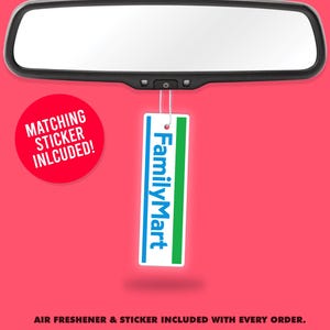 May include: A car's rearview mirror with a hanging air freshener featuring the FamilyMart logo in blue and green. A red circle with the text "Matching Sticker Included!" is on the left. The background is a solid red.