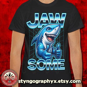1980s retro tshirt, JAWSOME, Shark meme shirt, funny wordplay apparel, black unisex tee, shark lover gift,